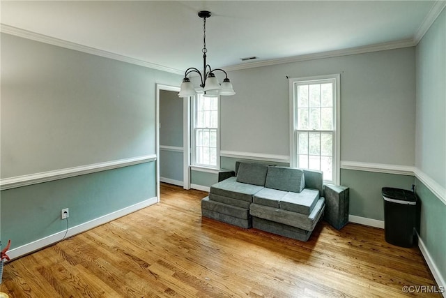 813 Spirea Rd, North Chesterfield, VA 23236 - sitting room featuring a chandelier, plenty of natural light, wood finished floors, and crown molding