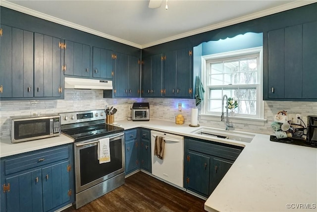813 Spirea Rd, North Chesterfield, VA 23236 - kitchen with appliances with stainless steel finishes, under cabinet range hood, decorative backsplash, light countertops, and dark wood finished floors