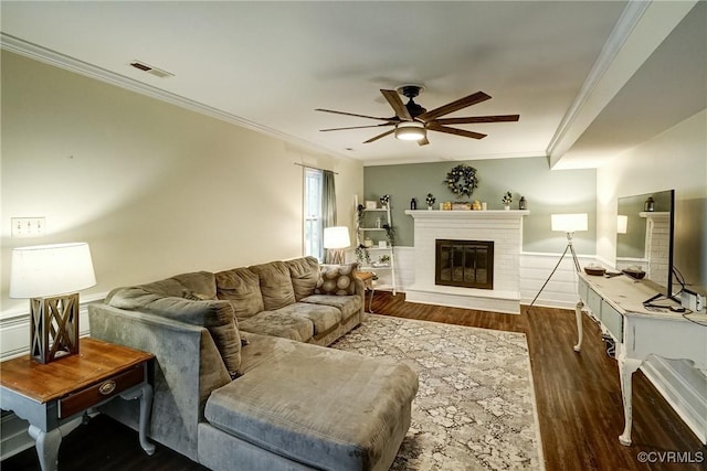 813 Spirea Rd, North Chesterfield, VA 23236 - living room with ceiling fan, dark wood-type flooring, crown molding, and a fireplace