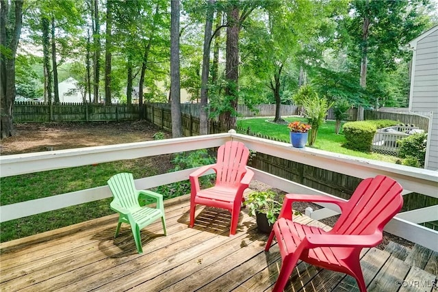 813 Spirea Rd, North Chesterfield, VA 23236 - deck with a fenced backyard and view of wooded area