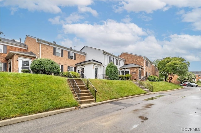 21 Rock Garden Ln, Henrico, VA 23228 - view of front of property with stairs, a residential view, and a front lawn