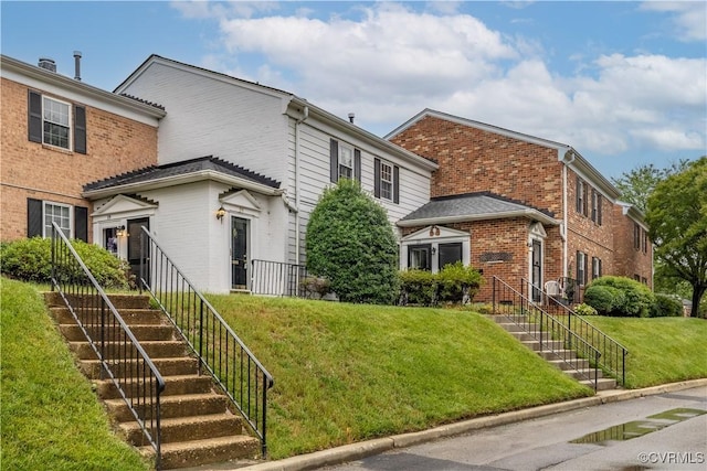 21 Rock Garden Ln, Henrico, VA 23228 - traditional home with brick siding and a front yard