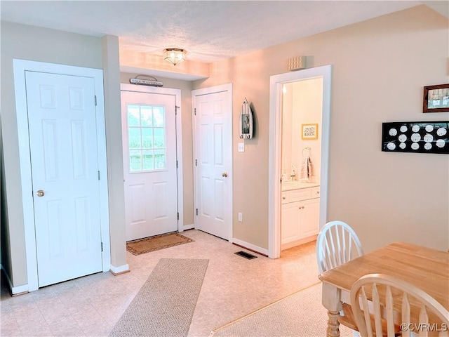 4030 Wellfords Wharf Rd, Warsaw, VA 22572 - entryway with baseboards
