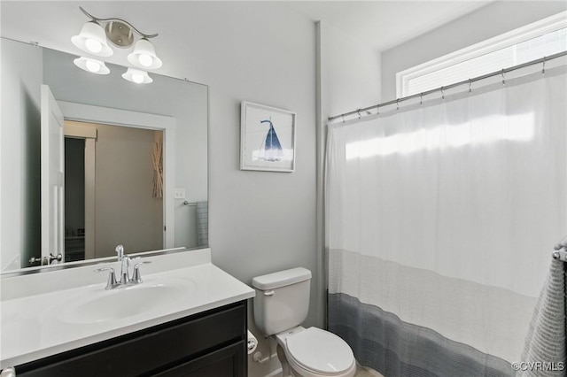 6906 Stafford Park Dr, Moseley, VA 23120 - bathroom featuring vanity and a shower with shower curtain