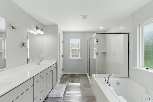 6906 Stafford Park Dr, Moseley, VA 23120 - bathroom featuring double vanity, a bath, and a shower stall