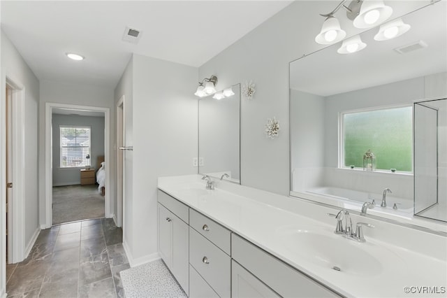 6906 Stafford Park Dr, Moseley, VA 23120 - ensuite bathroom featuring double vanity and a tub
