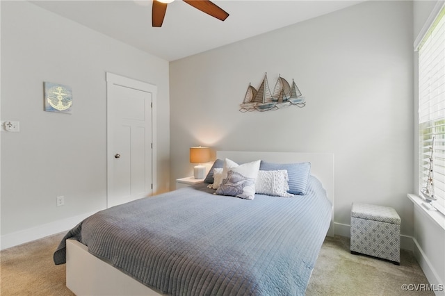6906 Stafford Park Dr, Moseley, VA 23120 - carpeted bedroom featuring multiple windows and a ceiling fan
