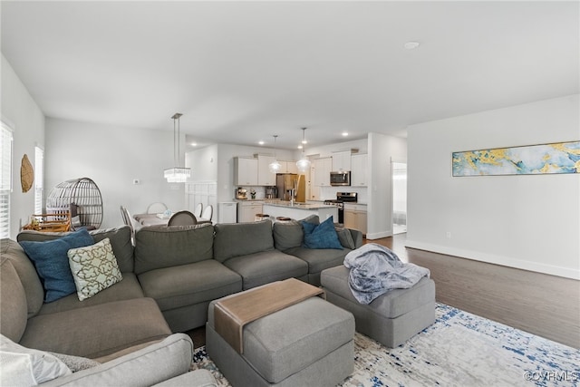 6906 Stafford Park Dr, Moseley, VA 23120 - living area featuring light wood-type flooring and recessed lighting