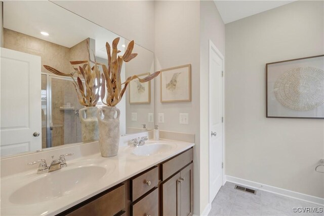 15707 Greenhart Dr, Chesterfield, VA 23832 - bathroom with a shower stall, double vanity, and tile patterned floors