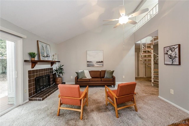 3111 Three Bridges Rd, Midlothian, VA 23112 - living room featuring a fireplace, stairway, a ceiling fan, carpet, and high vaulted ceiling