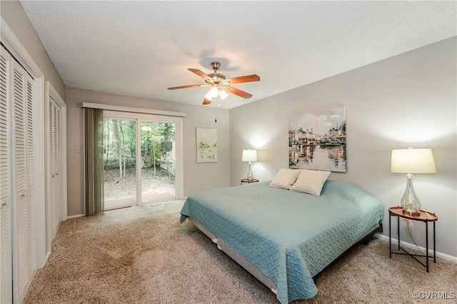 3111 Three Bridges Rd, Midlothian, VA 23112 - carpeted bedroom with access to exterior, a ceiling fan, and two closets