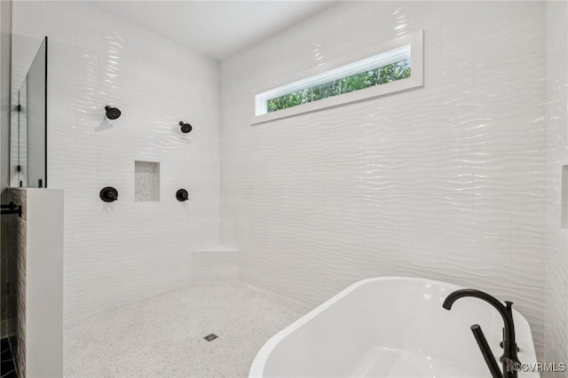 5-6 Pocahontas Trl, Providence Forge, VA 23089 - bathroom featuring a soaking tub and tiled shower