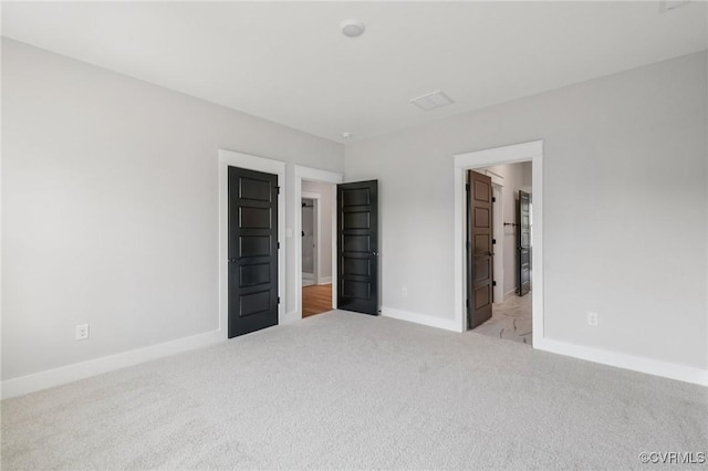 5-6 Pocahontas Trl, Providence Forge, VA 23089 - unfurnished bedroom featuring carpet floors and ensuite bath