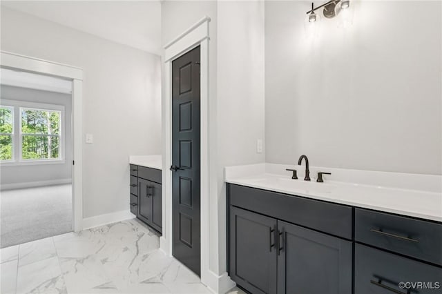5-6 Pocahontas Trl, Providence Forge, VA 23089 - bathroom with vanity and marble look tile flooring