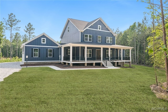 5-6 Pocahontas Trl, Providence Forge, VA 23089 - back of house with board and batten siding and a yard