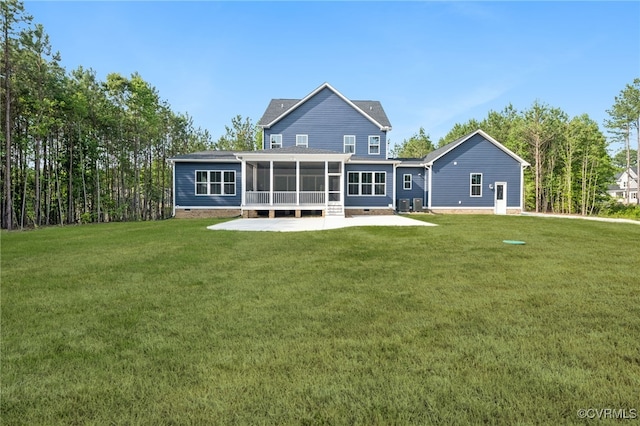 5-6 Pocahontas Trl, Providence Forge, VA 23089 - rear view of house with a sunroom, a yard, and a patio