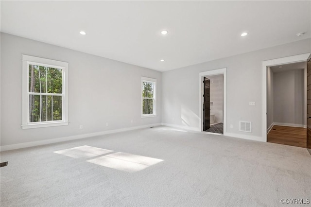 5-6 Pocahontas Trl, Providence Forge, VA 23089 - unfurnished bedroom with carpet floors, multiple windows, and recessed lighting