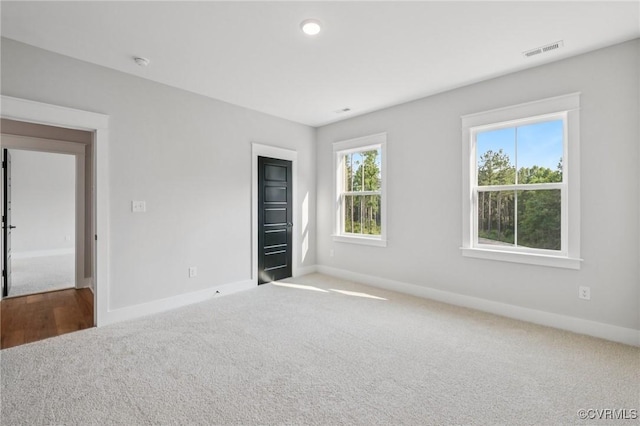 5-6 Pocahontas Trl, Providence Forge, VA 23089 - carpeted spare room with baseboards and a smoke detector