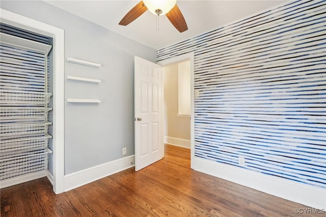 610 N 39th St, Richmond, VA 23223 - unfurnished bedroom with wood finished floors and baseboards