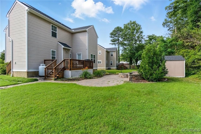 2201 Vandover Rd, Henrico, VA 23229 - back of house with a patio, a deck, a lawn, and a storage unit