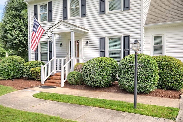 6661 Powhatan Dr, Hayes, VA 23072 - view of front of property featuring roof with shingles