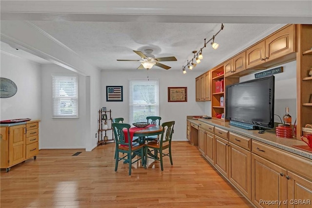 6661 Powhatan Dr, Hayes, VA 23072 - dining room with plenty of natural light, ceiling fan, and light wood-style flooring