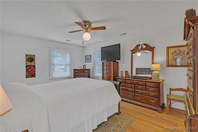 6661 Powhatan Dr, Hayes, VA 23072 - bedroom featuring light wood-type flooring and a ceiling fan