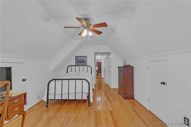 6661 Powhatan Dr, Hayes, VA 23072 - bedroom featuring light wood-style flooring, vaulted ceiling, and a ceiling fan
