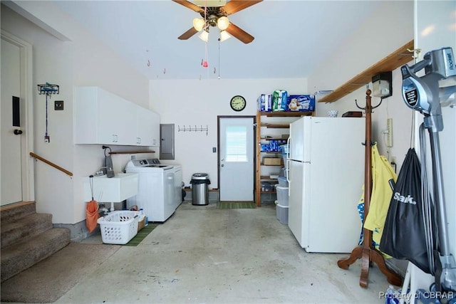 6661 Powhatan Dr, Hayes, VA 23072 - garage featuring freestanding refrigerator, washing machine and dryer, electric panel, and a ceiling fan