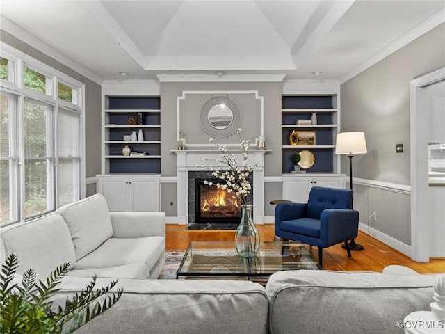 9313 Owl Trace Ct, Chesterfield, VA 23838 - living room featuring built in shelves, wood finished floors, a high end fireplace, and ornamental molding
