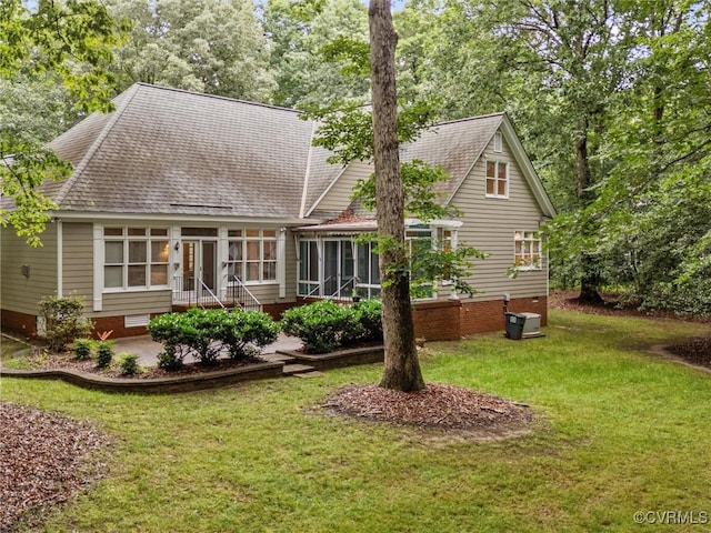9313 Owl Trace Ct, Chesterfield, VA 23838 - back of house featuring a sunroom, crawl space, a lawn, and roof with shingles