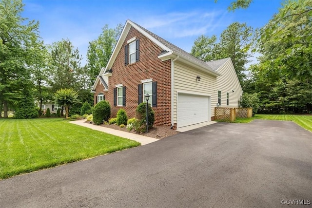 206 Twin Crest Dr, Chesterfield, VA 23236 - view of side of property featuring asphalt driveway, a yard, and brick siding