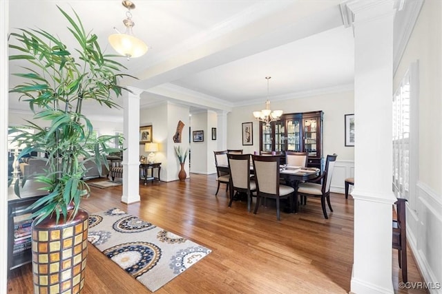 206 Twin Crest Dr, Chesterfield, VA 23236 - dining space featuring decorative columns, wood finished floors, ornamental molding, and a chandelier