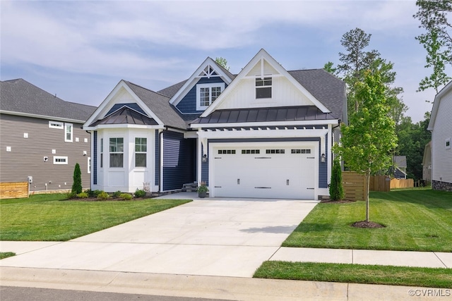 15813 Maclear Dr, Midlothian, VA 23112 - view of front of home with a standing seam roof, board and batten siding, driveway, a metal roof, and a shingled roof
