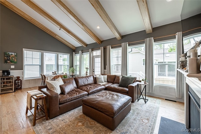 15813 Maclear Dr, Midlothian, VA 23112 - living room featuring light wood-style flooring, wainscoting, and a fireplace with flush hearth