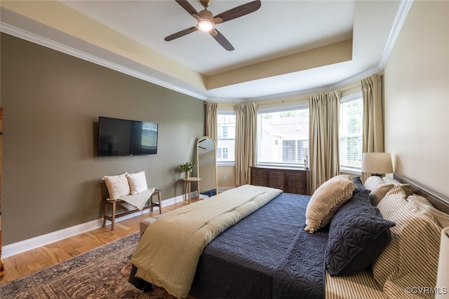 15813 Maclear Dr, Midlothian, VA 23112 - bedroom featuring wood finished floors, ornamental molding, a ceiling fan, and a tray ceiling