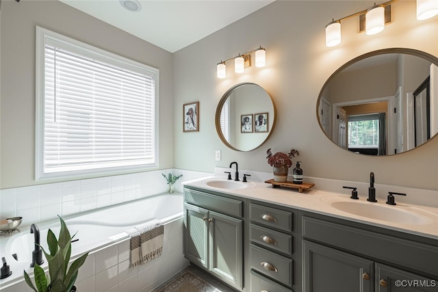 15813 Maclear Dr, Midlothian, VA 23112 - bathroom with double vanity and a garden tub