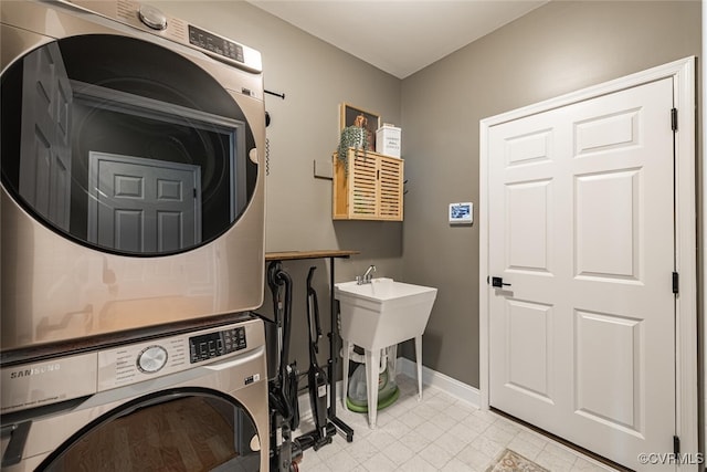 15813 Maclear Dr, Midlothian, VA 23112 - laundry area featuring stacked washing machine and dryer and light tile patterned floors