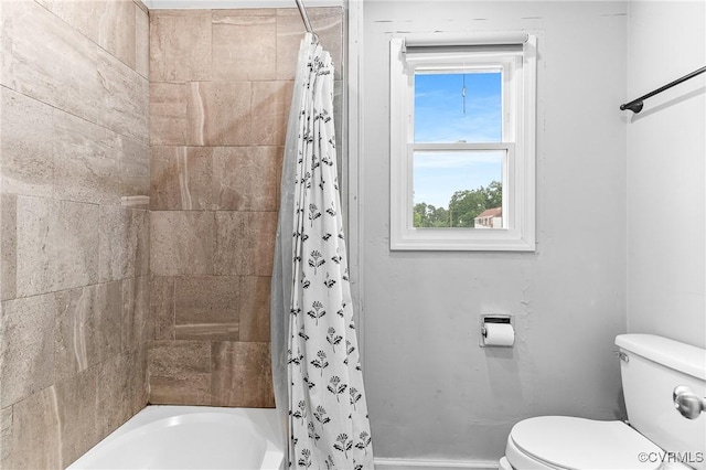 1426 Overlook St, Ampthill, VA 23224 - bathroom featuring baseboards and shower / tub combo with curtain