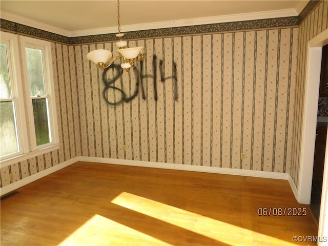 9630 Beaver Bridge Rd, Chesterfield, VA 23838 - unfurnished dining area with a chandelier, wood finished floors, and crown molding