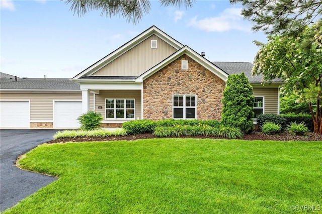 307 Kernel Ct, North Chesterfield, VA 23236 - craftsman-style home with stone siding, board and batten siding, driveway, an attached garage, and a front yard