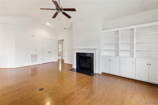 307 Kernel Ct, North Chesterfield, VA 23236 - unfurnished living room with ceiling fan, lofted ceiling, wood finished floors, and a fireplace