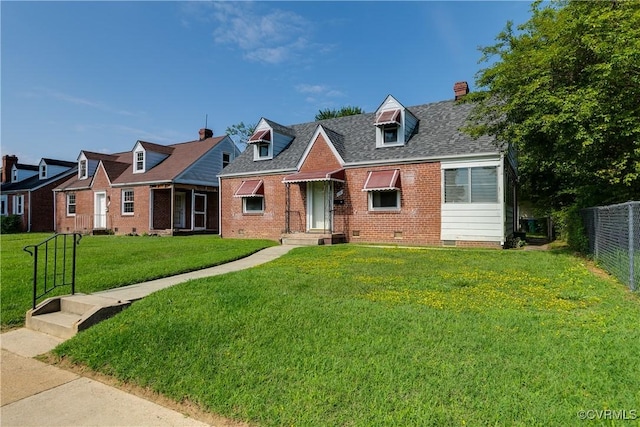 18 E 36th St, Richmond, VA 23224 - cape cod house with crawl space, brick siding, a chimney, and roof with shingles