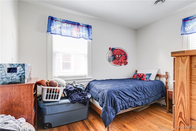 18 E 36th St, Richmond, VA 23224 - bedroom featuring wood finished floors