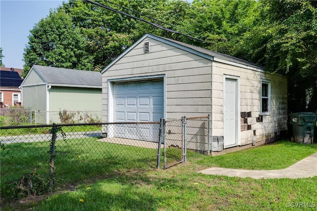 18 E 36th St, Richmond, VA 23224 - detached garage featuring driveway