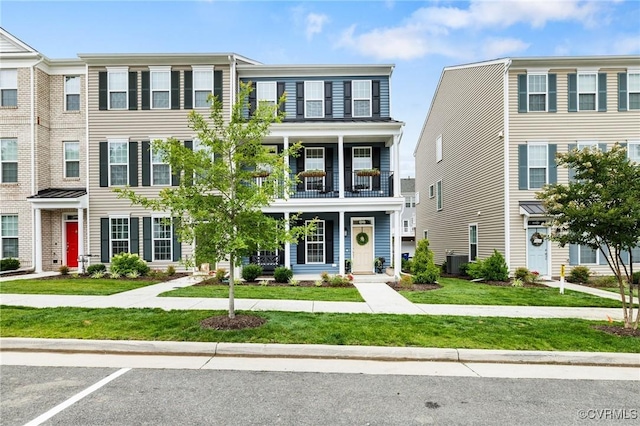 6988 Leire Ln, Chesterfield, VA 23832 - townhome / multi-family property featuring a balcony and a front yard