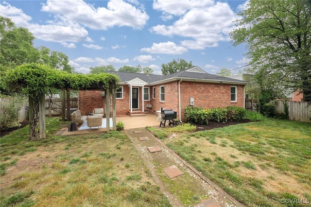 8507 Hanford Dr, Henrico, VA 23229 - back of property with a patio, a fenced backyard, brick siding, and entry steps