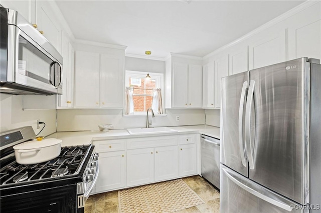 8507 Hanford Dr, Henrico, VA 23229 - kitchen with stainless steel appliances, white cabinets, crown molding, and light countertops
