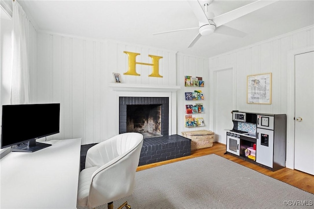 8507 Hanford Dr, Henrico, VA 23229 - living room featuring wood finished floors, ceiling fan, and a fireplace