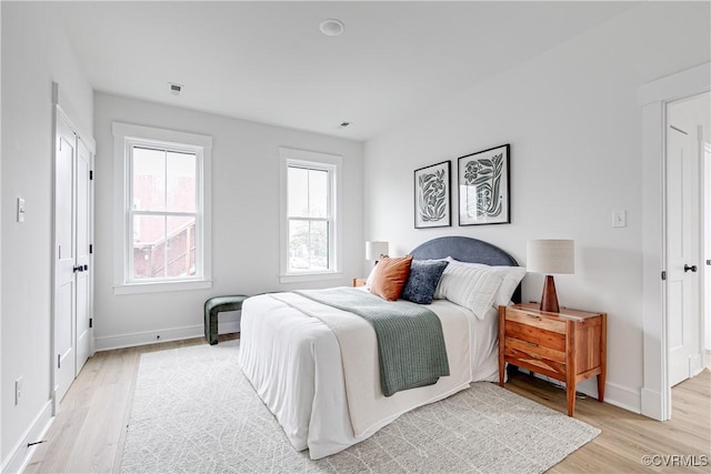 1823 W Cary St Unit A, Richmond, VA 23220 - bedroom featuring light wood finished floors and multiple windows